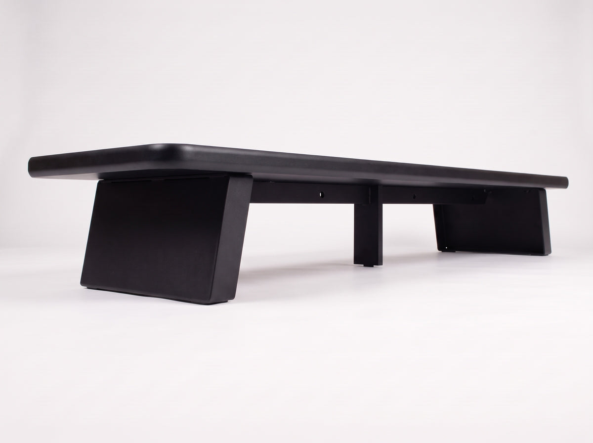 M30S Monitor Riser in Matte Black – low view of the feet and underside | Rablo #Color_Matte Black