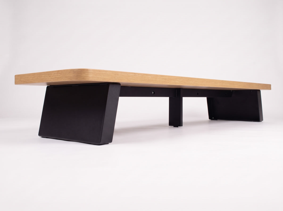M30S Monitor Riser in Oak – low view of the feet and underside | Rablo #Color_Oak