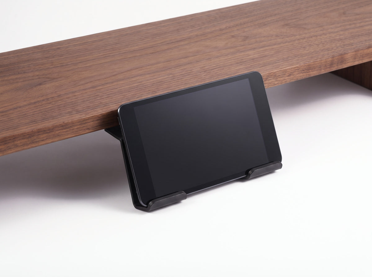 Tablet Stand for Monitor Riser in Black – styled studio packshot | Rablo