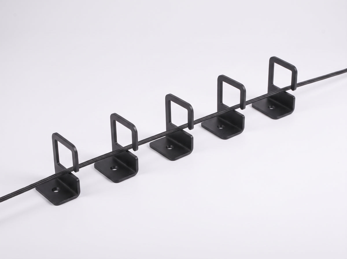 Cable Organizer for Monitor Riser (5-Pack) in Black – styled studio packshot | Rablo